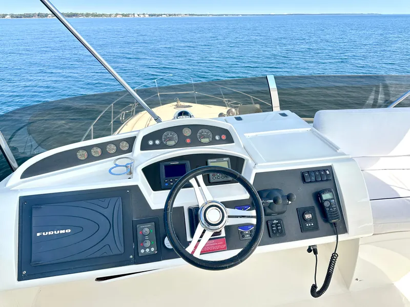 Slide: The Image of Viking Princess F54 flybridge 2009 helm on open sea. - 11