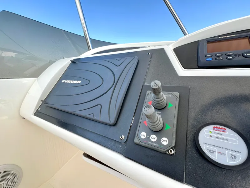Slide: The Image of Control panel of 2009 Viking Princess F54 flybridge with Furuno system. - 12