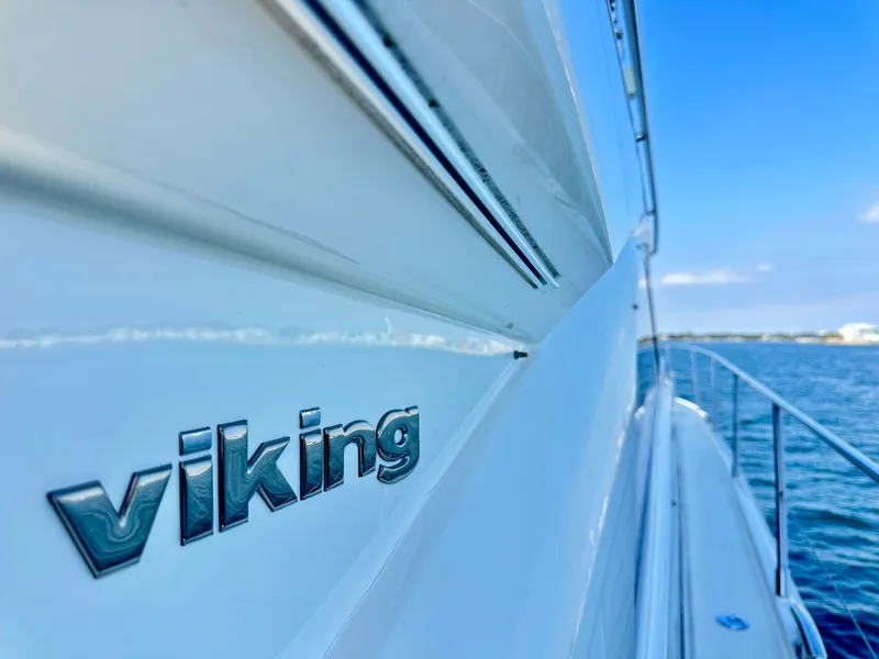 Slide: The Image of Viking Princess F54 Flybridge yacht from 2009 on open sea. - 22