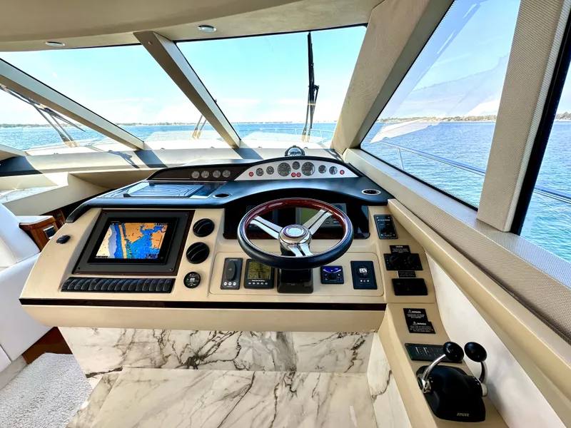Slide: The Image of Viking Princess F54 Flybridge 2009 helm with ocean view. - 26