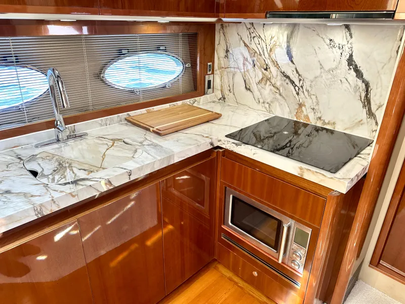 Slide: The Image of Luxurious kitchen on a 2009 Viking Princess F54 flybridge. - 33