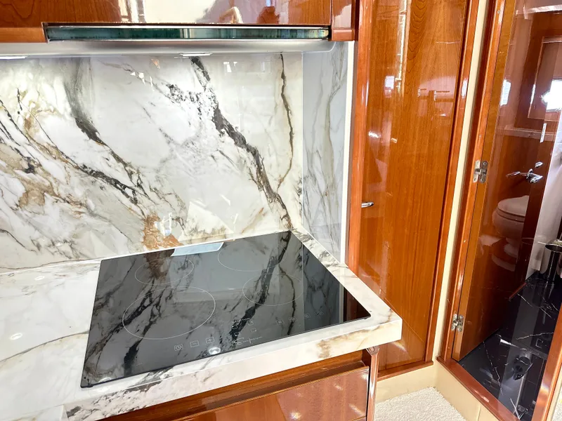 Slide: The Image of Luxurious kitchen on a 2009 Princess F54 Flybridge yacht. - 34