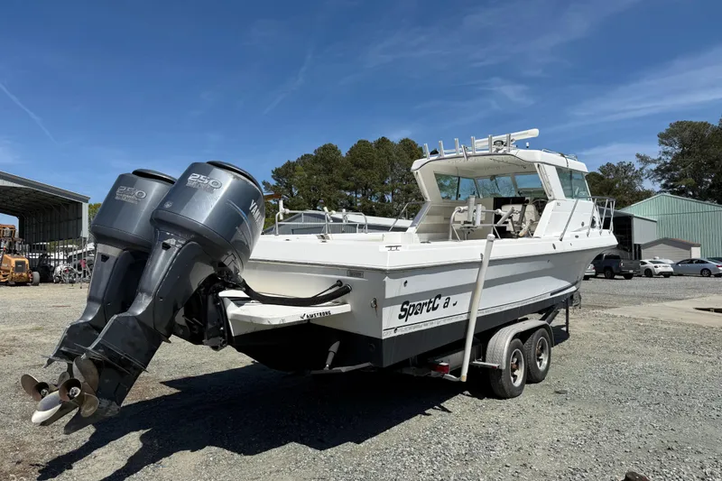Slide: The Image of 2007 Sport-Craft 302 Sport Fish boat on trailer with dual Yamaha outboard motors. - 9