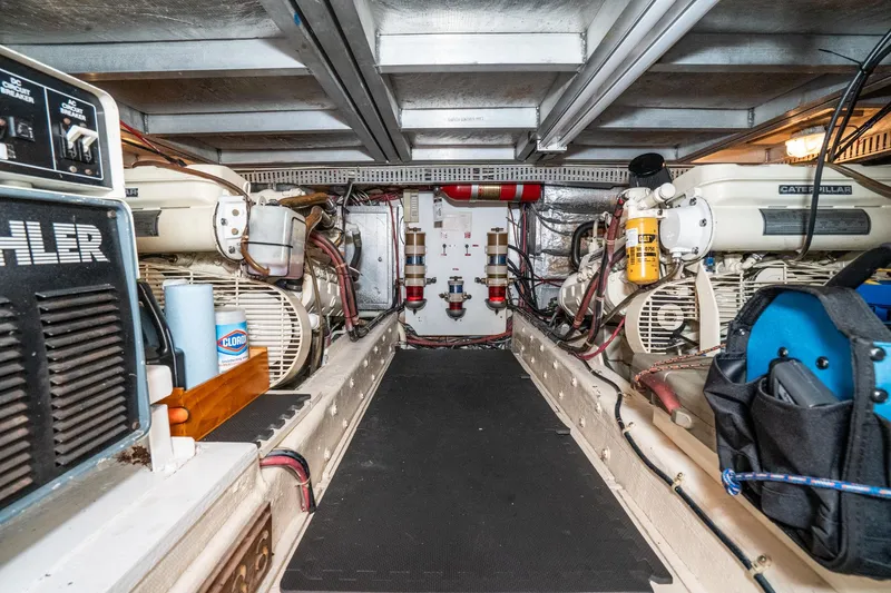 Slide: The Image of Engine room of 1989 Californian 48 Cockpit Motor Yacht with Kohler and Caterpillar equipment. - 61