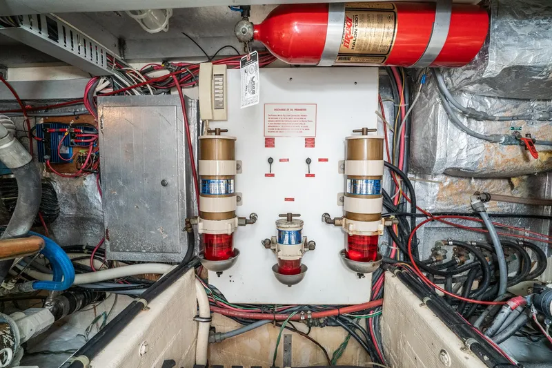 Slide: The Image of Engine room of 1989 Californian 48 Cockpit Motor Yacht with fire suppression system. - 67