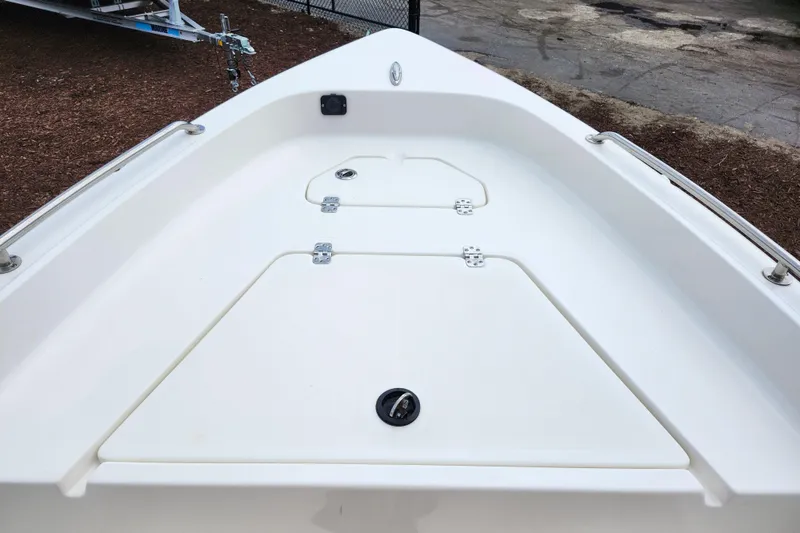 Slide: The Image of 2024 Key West 1720 Center Console boat deck with storage compartments. - 17