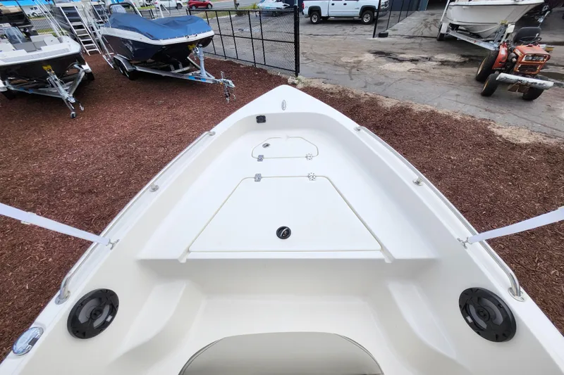 Slide: The Image of 2024 Key West 1720 Center Console boat on display at a dealership. - 18