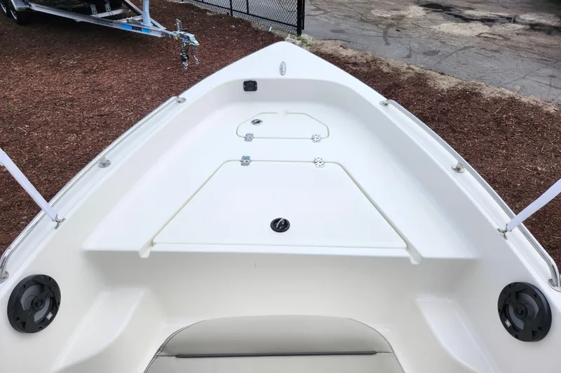 Slide: The Image of 2024 Key West 1720 Center Console boat deck, featuring spacious storage compartments. - 19