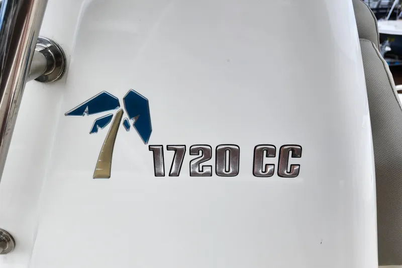 Slide: The Image of Key West 1720 Center Console 2024 logo on boat exterior. - 25