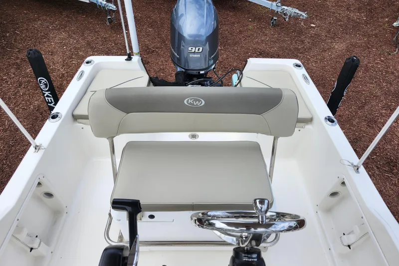 Slide: The Image of 2024 Key West 1720 Center Console boat interior with Yamaha 90 engine. - 26