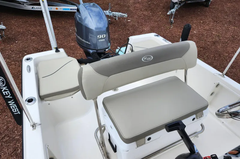 Slide: The Image of 2024 Key West 1720 Center Console boat interior with Yamaha 90 engine. - 28