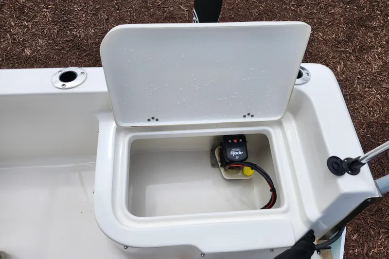 Slide: The Image of Open storage compartment on 2024 Key West 1720 Center Console boat. - 36