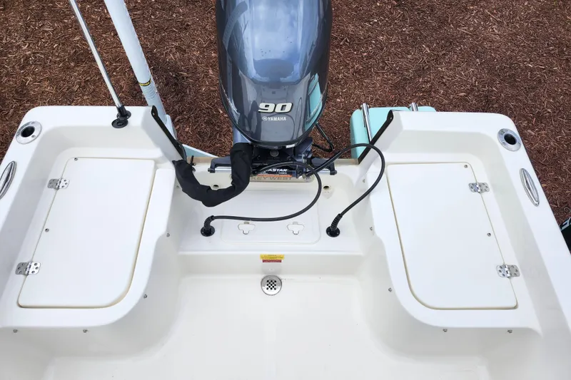 Slide: The Image of 2024 Key West 1720 Center Console boat with Yamaha 90 engine, rear view. - 7