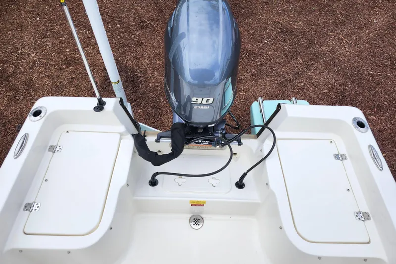 Slide: The Image of 2024 Key West 1720 Center Console boat with Yamaha 90 engine, rear view. - 9