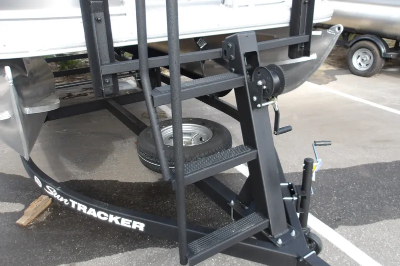 Slide: The Image of Trailer hitch and steps of 2026 Sun Tracker Bass Buggy 16 XL Select boat. - 17