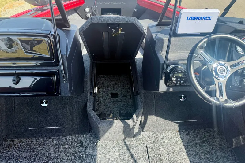 Slide: The Image of Interior of 2026 Tracker Targa V-18 Combo boat with steering wheel and control panel. - 13