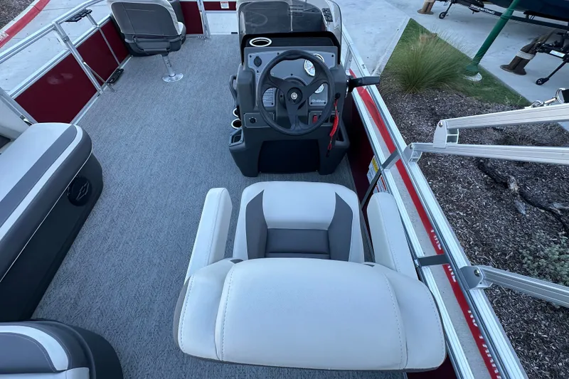 Slide: The Image of Interior of 2026 Sun Tracker Bass Buggy 18 DLX pontoon boat with steering console. - 20