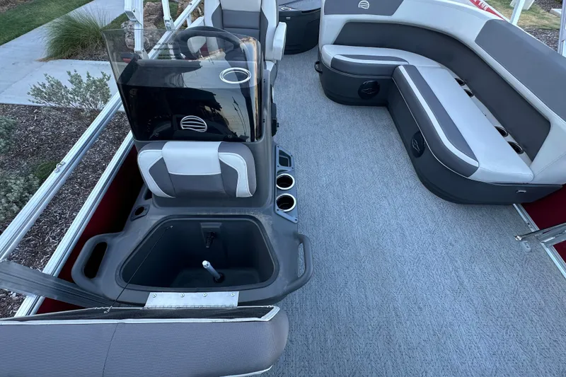 Slide: The Image of Interior of 2026 Sun Tracker Bass Buggy 18 DLX pontoon boat with seating and console. - 23