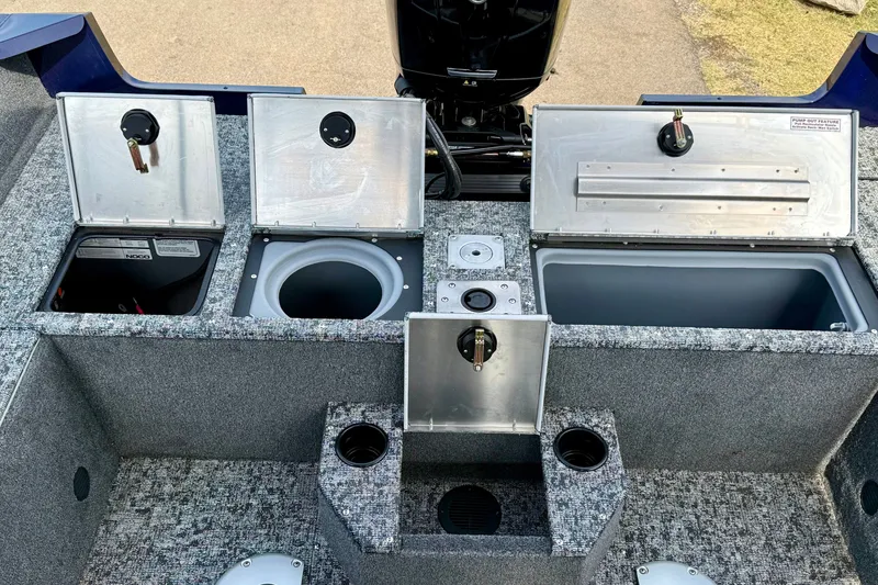 Slide: The Image of 2026 Tracker Pro Guide V-175 WT boat interior with storage compartments and livewell. - 15