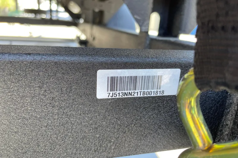 Slide: The Image of Barcode and serial number on 2026 Sun Tracker Party Barge 20 DLX boat frame. - 92