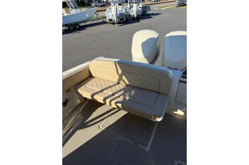 Slide: The Image of 2015 Chris-Craft 291 Catalina boat interior with seating and table setup. - 9