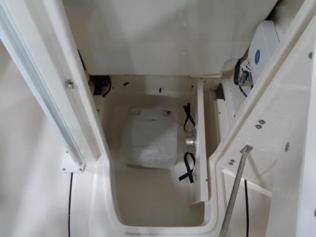 Slide: The Image of Interior of 2023 Robalo 246 Cayman with storage compartment. - 6