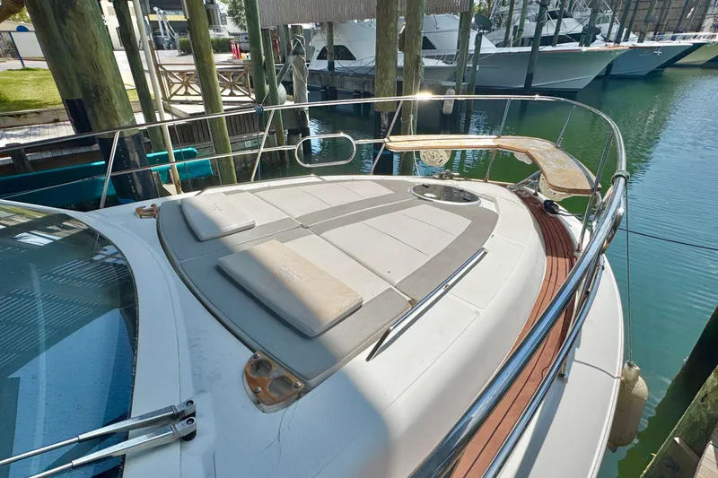 Slide: The Image of Bow view of 2020 Evolve 360HT yacht docked at marina. - 4