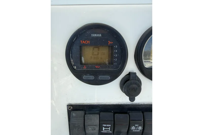 Slide: The Image of Yamaha tachometer on 2004 Regulator 21 Forward Seating boat dashboard. - 5