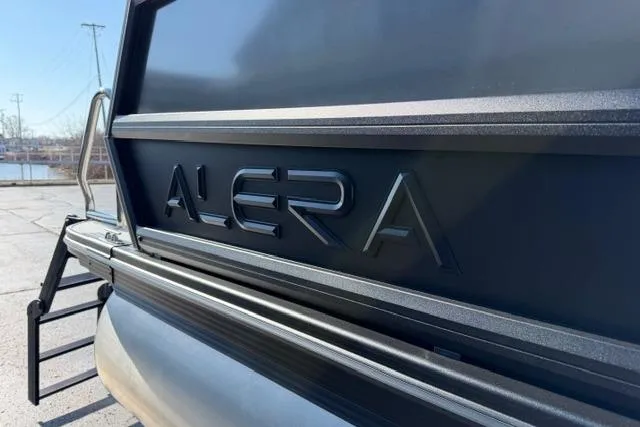 Slide: The Image of 2026 Alera A22Q boat with sleek design and prominent logo. - 3