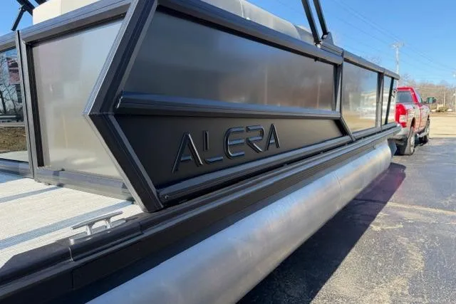 Slide: The Image of 2026 Alera A22Q pontoon boat on trailer, showcasing sleek design and branding. - 4