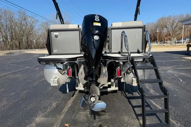 Slide: The Image of Alera A22Q 2026 boat with outboard motor and rear ladder on a sunny day. - 7