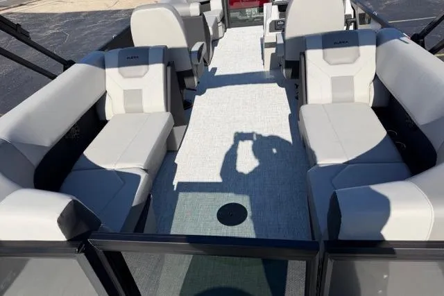 Slide: The Image of Interior view of 2026 Alera A22Q boat with spacious seating and modern design. - 9