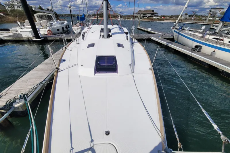 Slide: The Image of 2017 Jeanneau Sun Odyssey 44 DS sailboat docked at marina, viewed from deck. - 15
