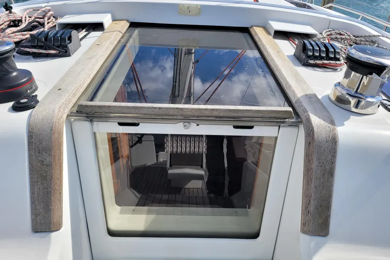 Slide: The Image of 2017 Jeanneau Sun Odyssey 44 DS yacht deck with hatch and winches. - 19