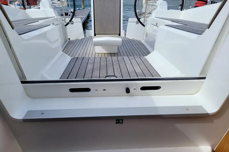 Slide: The Image of Cockpit view of 2017 Jeanneau Sun Odyssey 44 DS sailboat with teak flooring. - 22