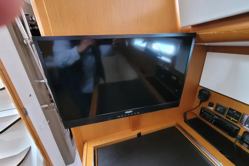 Slide: The Image of Interior of 2017 Jeanneau Sun Odyssey 44 DS yacht with mounted flat-screen TV. - 32