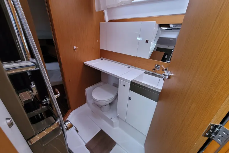 Slide: The Image of Bathroom interior of 2017 Jeanneau Sun Odyssey 44 DS yacht, featuring modern fixtures. - 38