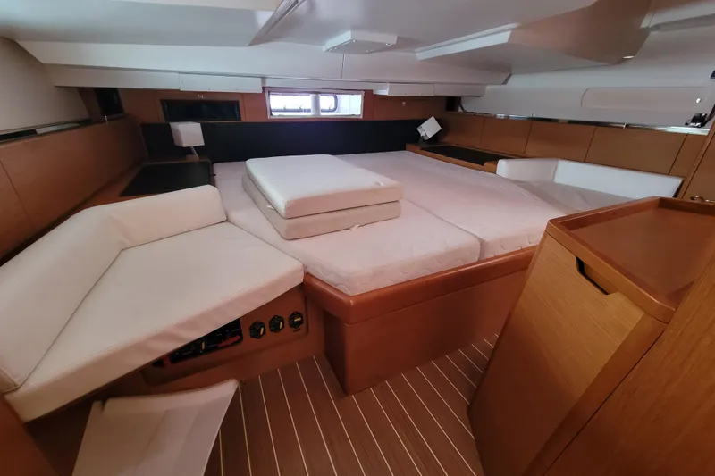 Slide: The Image of Luxurious interior of 2017 Jeanneau Sun Odyssey 44 DS yacht with spacious bed and seating. - 41