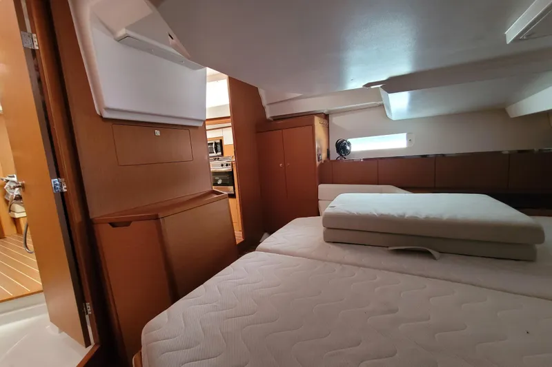 Slide: The Image of Interior of 2017 Jeanneau Sun Odyssey 44 DS yacht, featuring cozy cabin and modern amenities. - 43