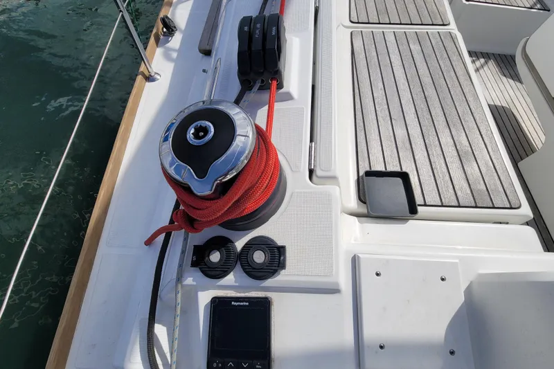 Slide: The Image of Deck of 2017 Jeanneau Sun Odyssey 44 DS with winch and red rope. - 8