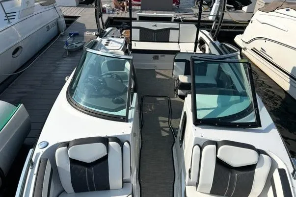 Slide: The Image of 2020 Monterey 278SS Super Sport boat docked, featuring sleek design and comfortable seating. - 6