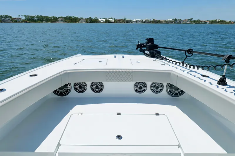 Slide: The Image of Freeman 34VH 2023 boat on water, featuring spacious deck and modern design. - 28