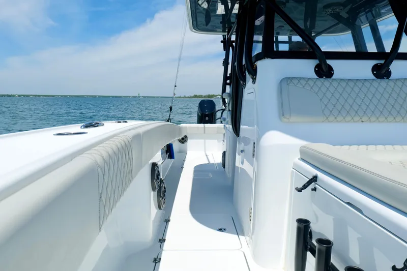 Slide: The Image of 2023 Freeman 34VH boat interior with sleek design on open water. - 35