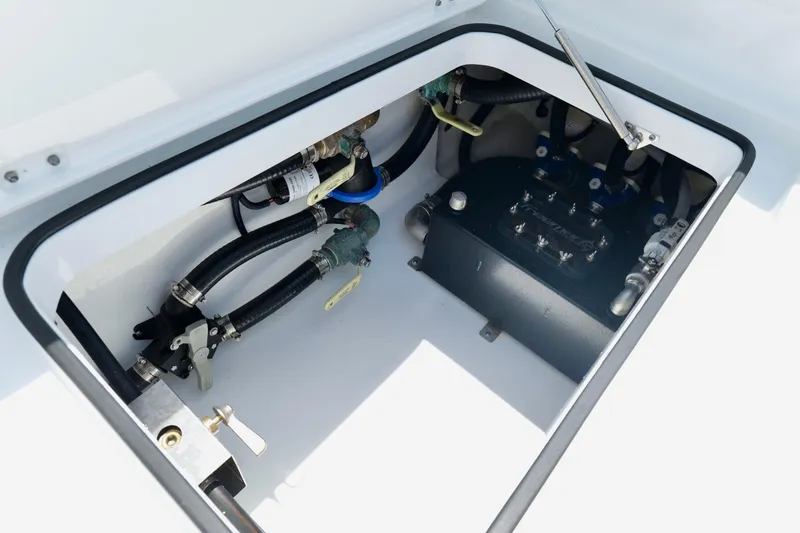Slide: The Image of Compartment of 2023 Freeman 34VH boat showing mechanical components and wiring. - 38