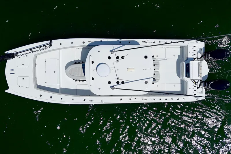 Slide: The Image of Aerial view of 2023 Freeman 34VH boat on green water. - 41