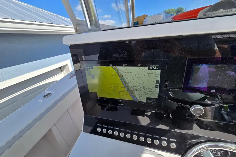 Slide: The Image of Full Garmin Package twin displays, GPS, Sonar, Radar, Autopilot, engine and battery systems connected to Garmin network - 3