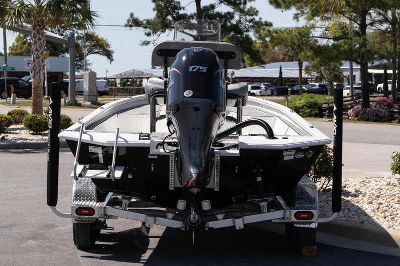 The Image of Avid 21 Mag 2026 boat with Yamaha 175 engine on trailer in sunny outdoor setting. - 10