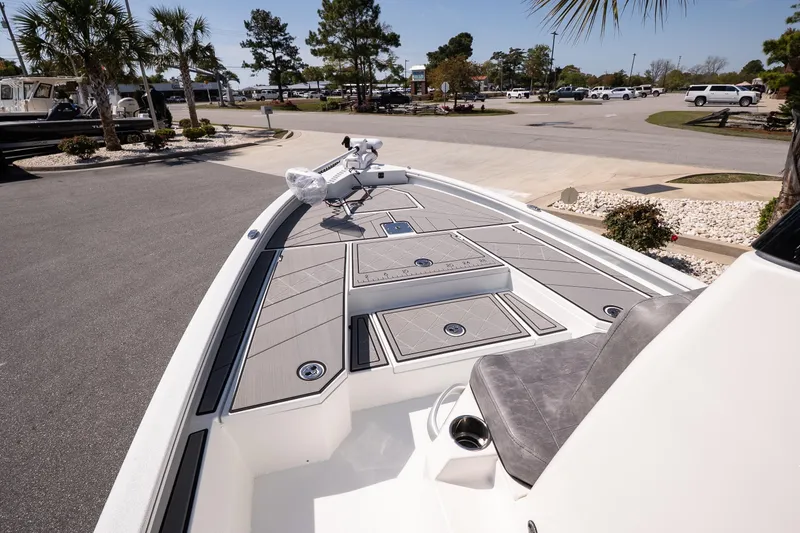 Slide: The Image of Avid 21 Mag 2026 boat with sleek deck design and modern seating. - 17
