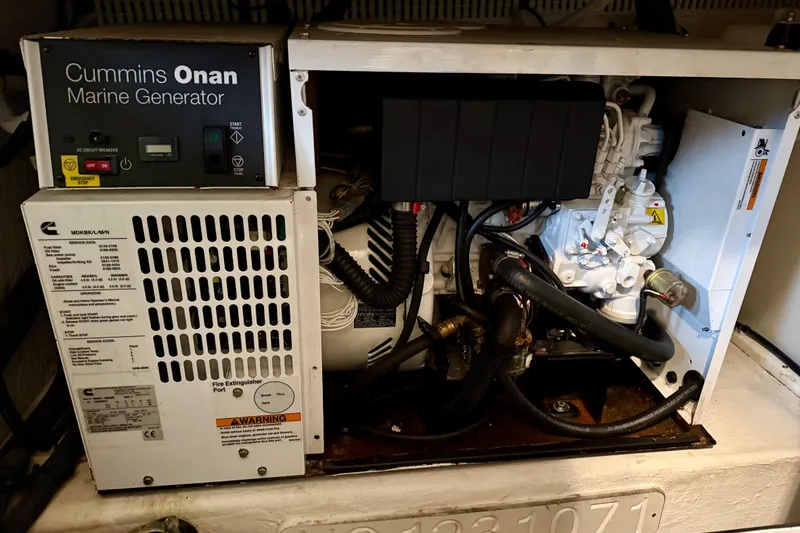 Slide: The Image of Cummins Onan marine generator in 2011 Back Cove 37 boat engine room. - 46