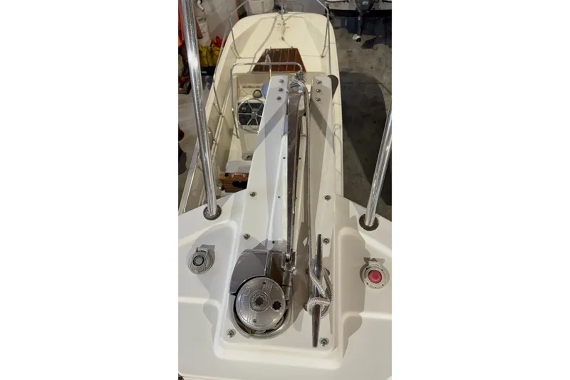 Slide: The Image of 2011 Back Cove 37 boat deck with anchor winch and steering wheel. - 7